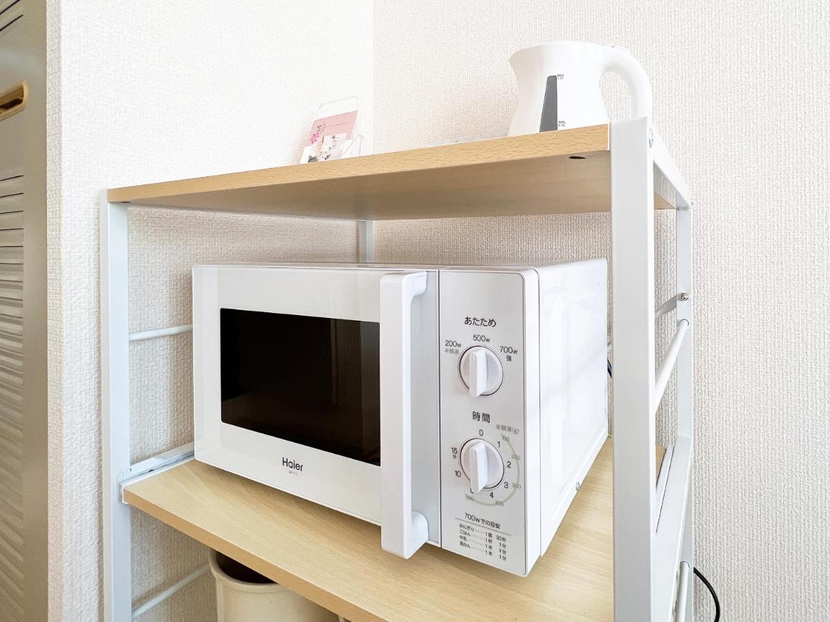 Ouchi Hotel Nishi-Tokaichi Хирошима Екстериор снимка